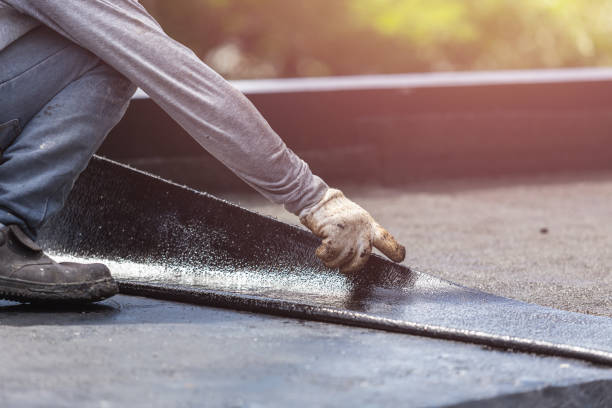 Professional Basement Waterproofing technician working in Morganton, NC
